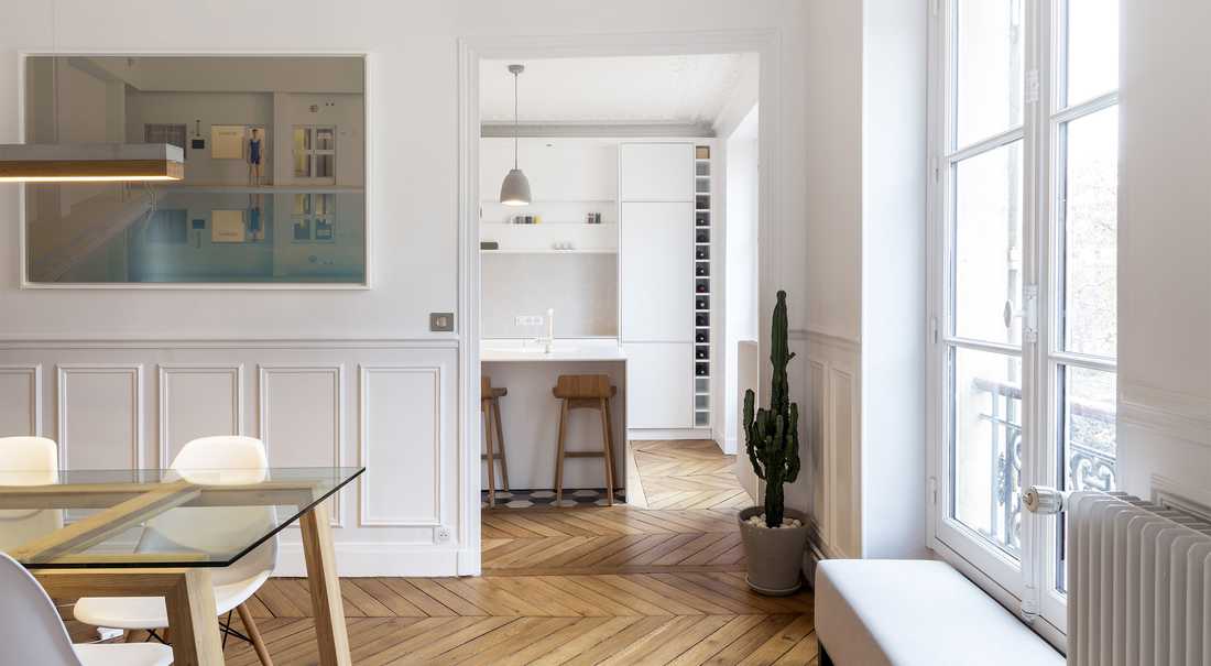 Aménagement d'un cuisine ouverte dans un salon par un architecte à Biarritz
