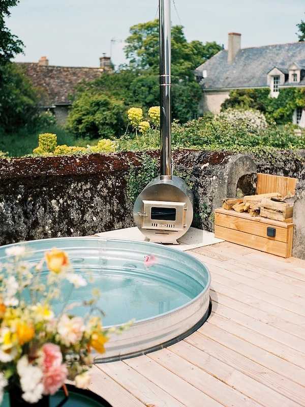 Transformation grange en maison d'hôtes - terrasse avec jacuzzi